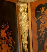 A Napoleon III Gilt Bronze Mounted Marquetry Marble-Top Serpentine Cabinet