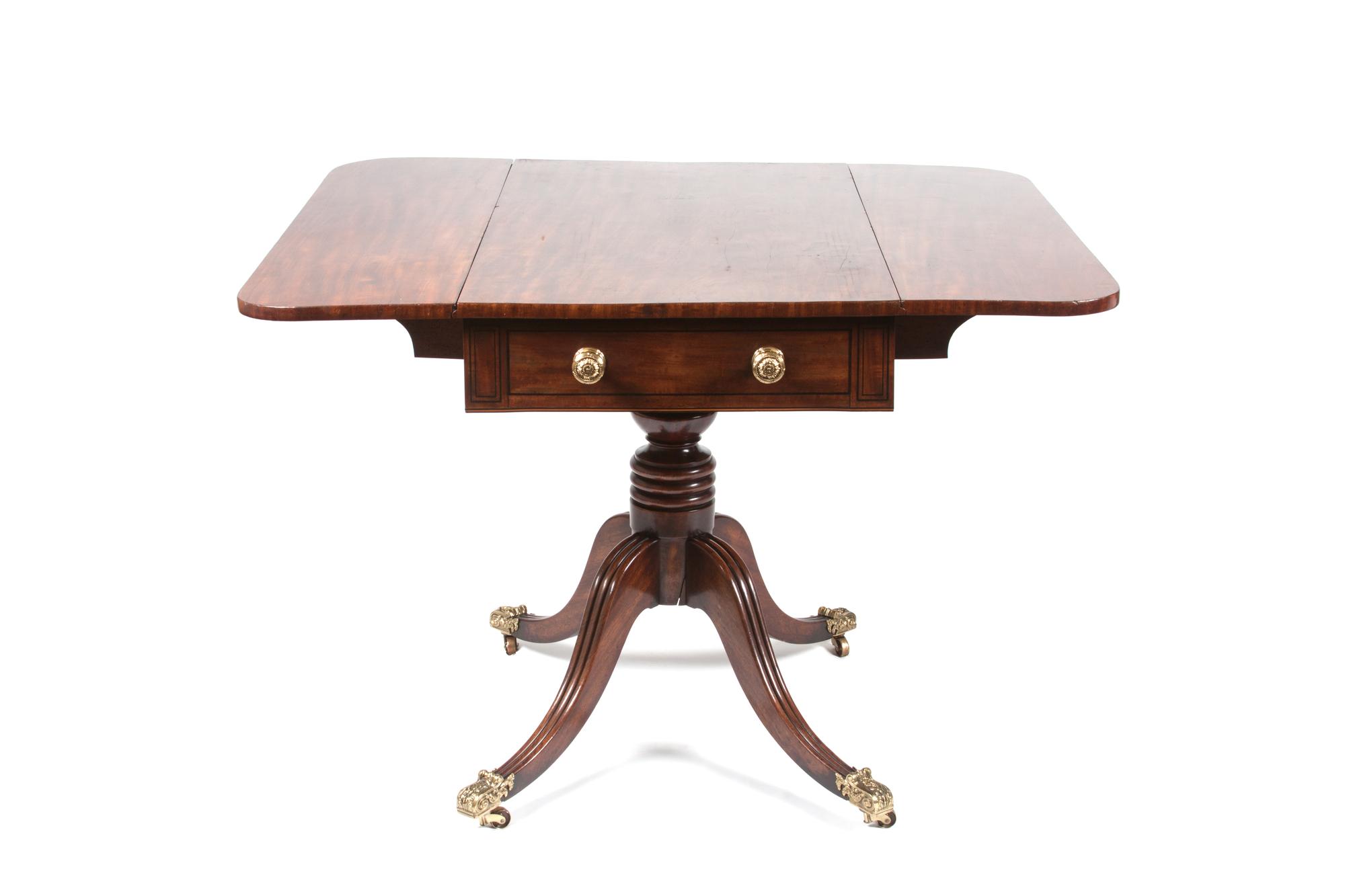 A Regency Mahogany Pembroke Table Height 39 1/2 x width 41 1/4 x depth 37 1/2 inches.