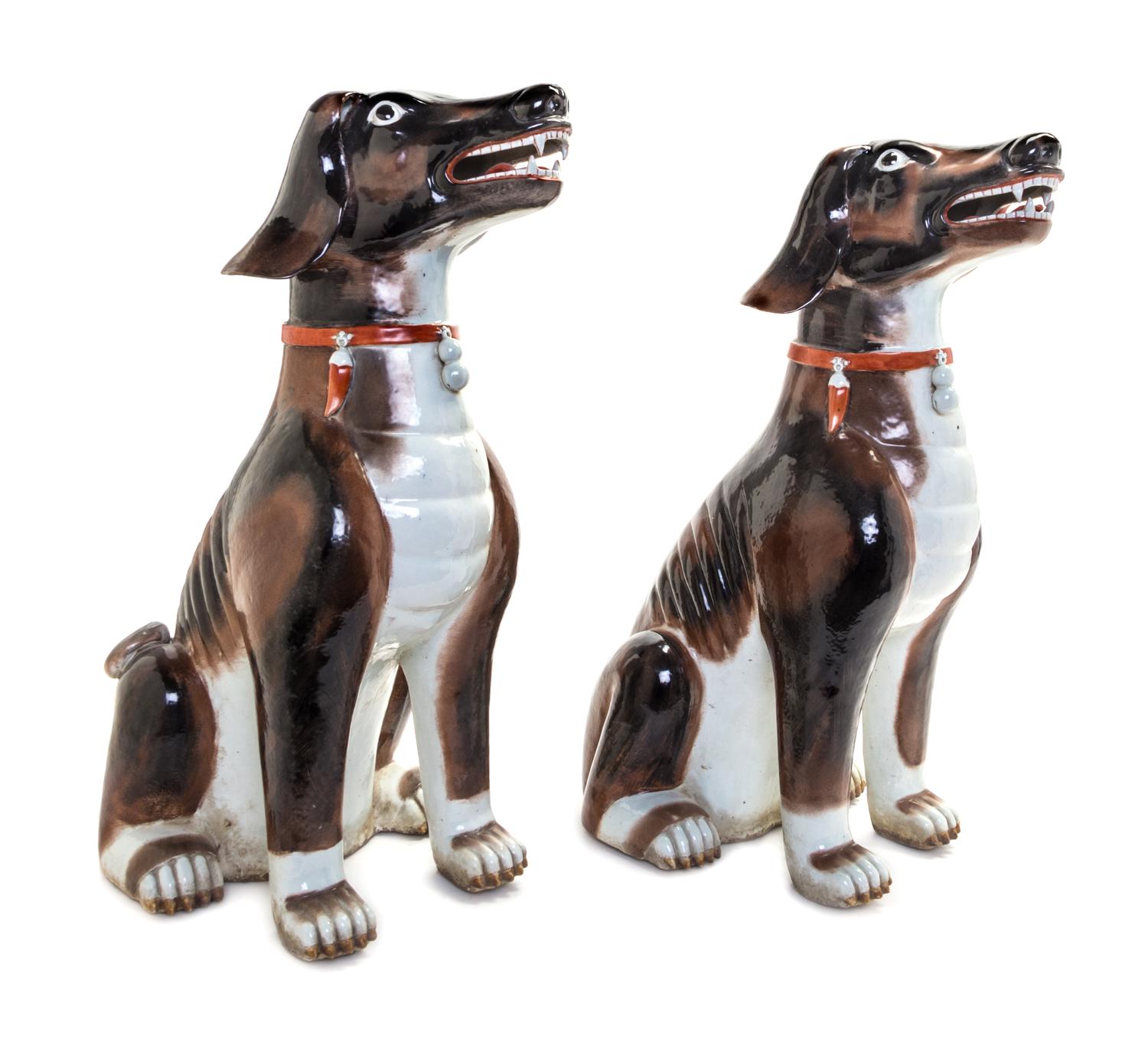 A Pair of Chinese Export Porcelain Models of Dogs Height 23 inches.