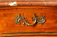 A Regence Style Gilt Bronze Mounted Parquetry Marble-Top Commode