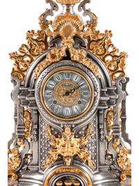 An Italian Gilt and Silvered Metal Mantel Clock