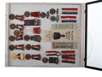 [CIVIL WAR -GRAND ARMY OF THE REPUBLIC & WOMEN'S RELIEF CORPS]. A large group of GAR, WRC, and other veterans' group ribbons and badges from Michigan, Wisconsin Indiana, and Illinois.