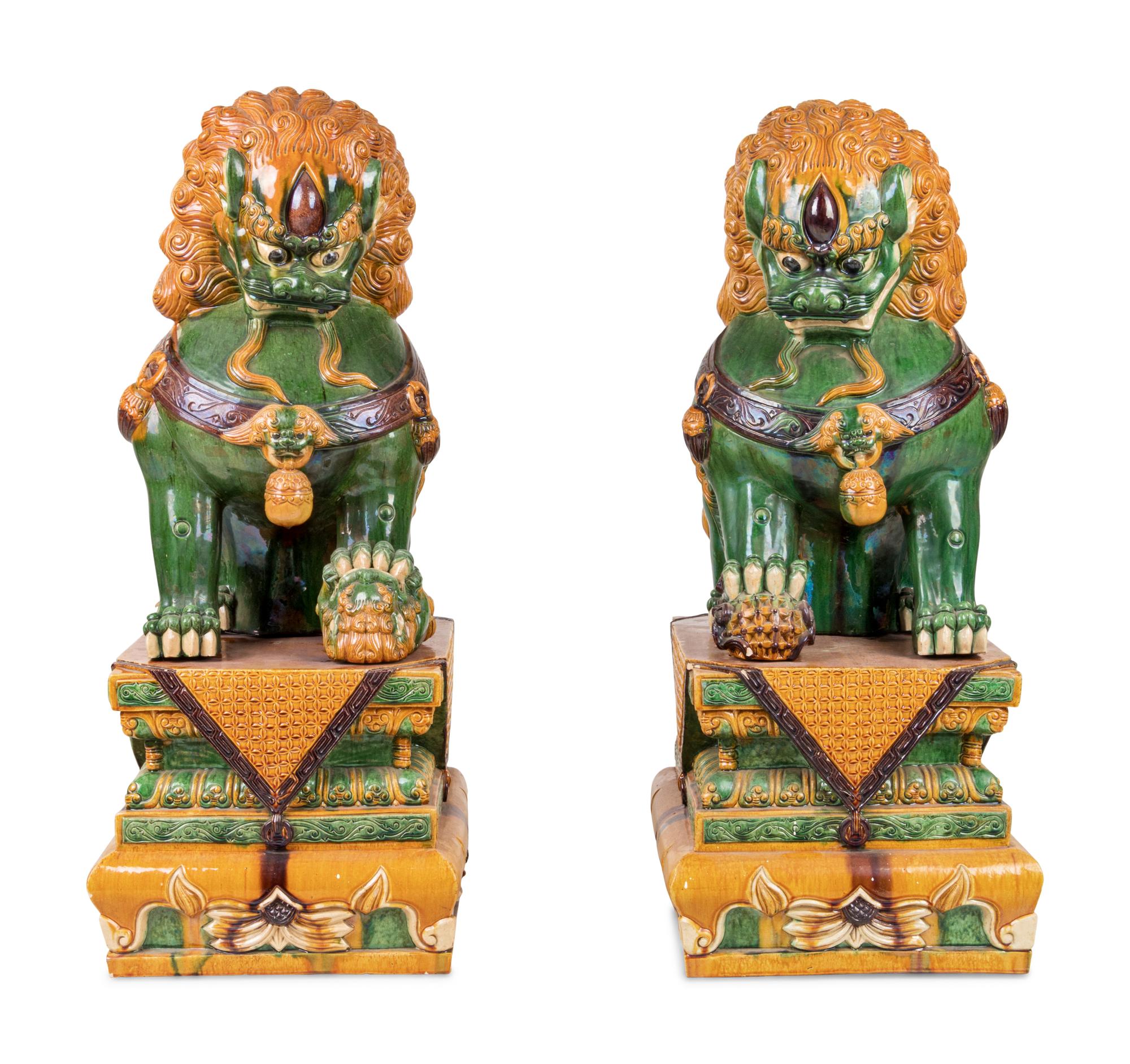 A Large Pair of Chinese Sancai Glazed Porcelain Fu Lions