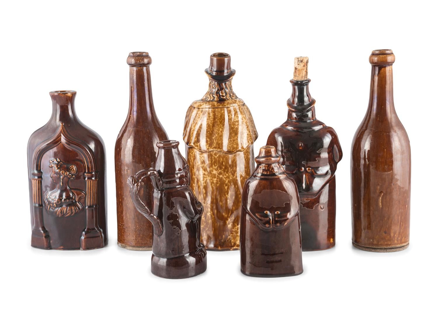 Seven Bottles in Brown Glaze