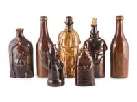 Seven Bottles in Brown Glaze