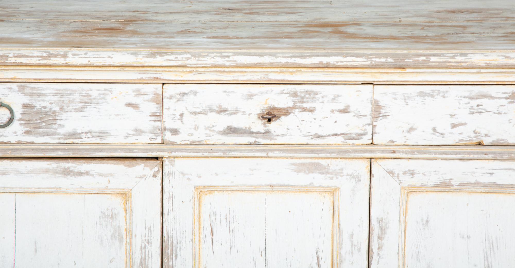 A French Provincial White-Painted Serving Cabinet