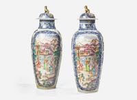 A pair of large and finely painted Chinese Export porcelain Famille Rose covered vases, 18th century