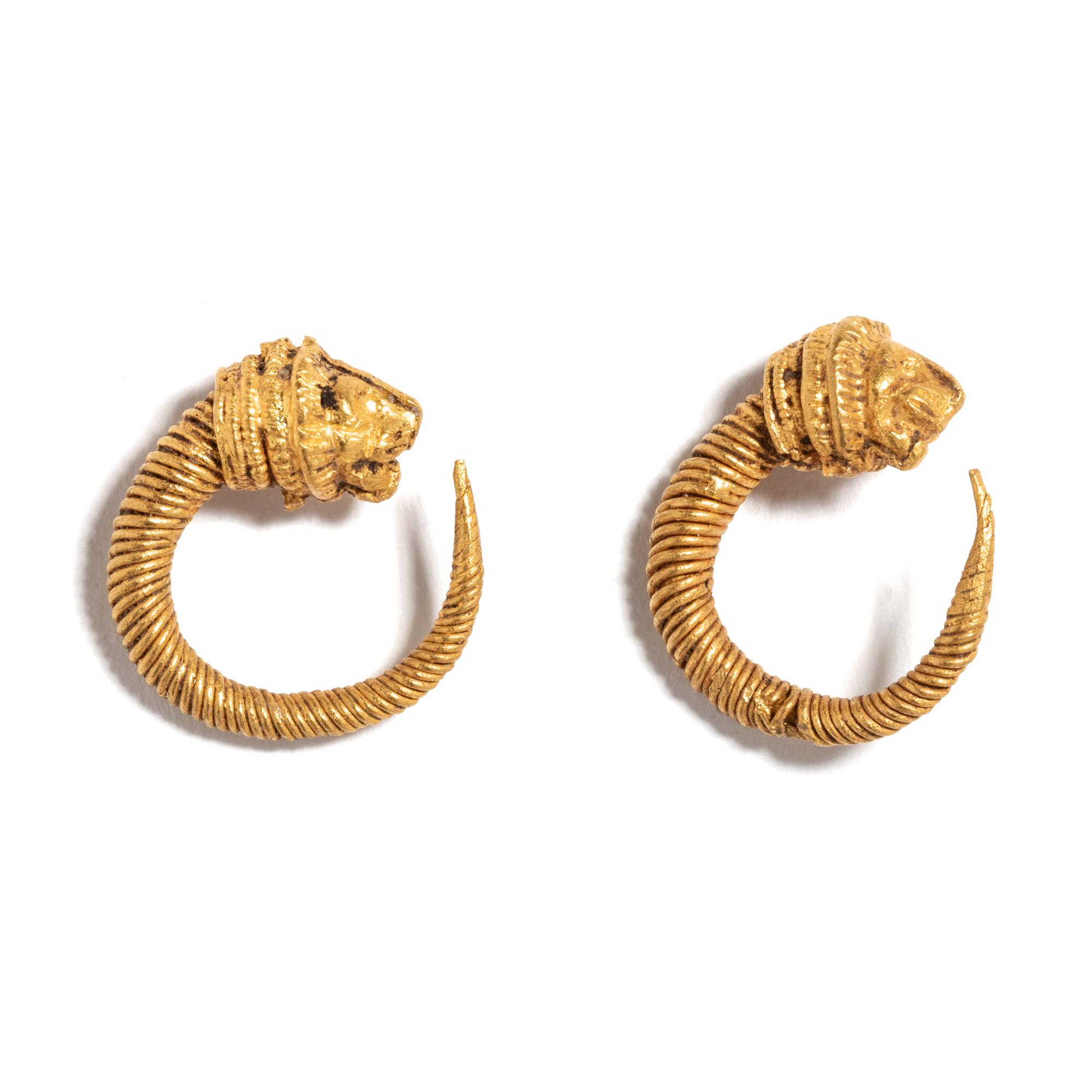 A Pair of Hellenistic Gold Hoop Earrings with Lion-Head Terminals