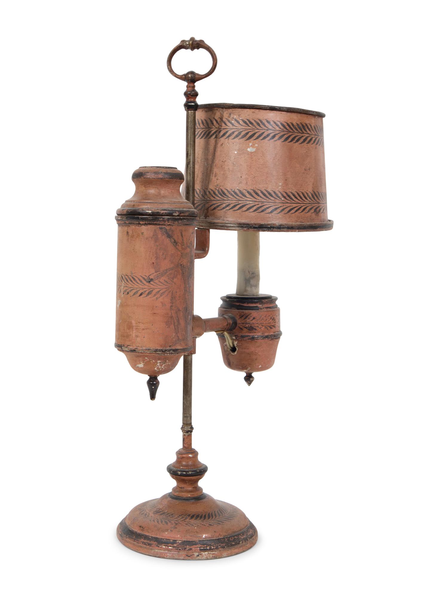 A French Tôle Peinte and Cast Iron Oil Lamp