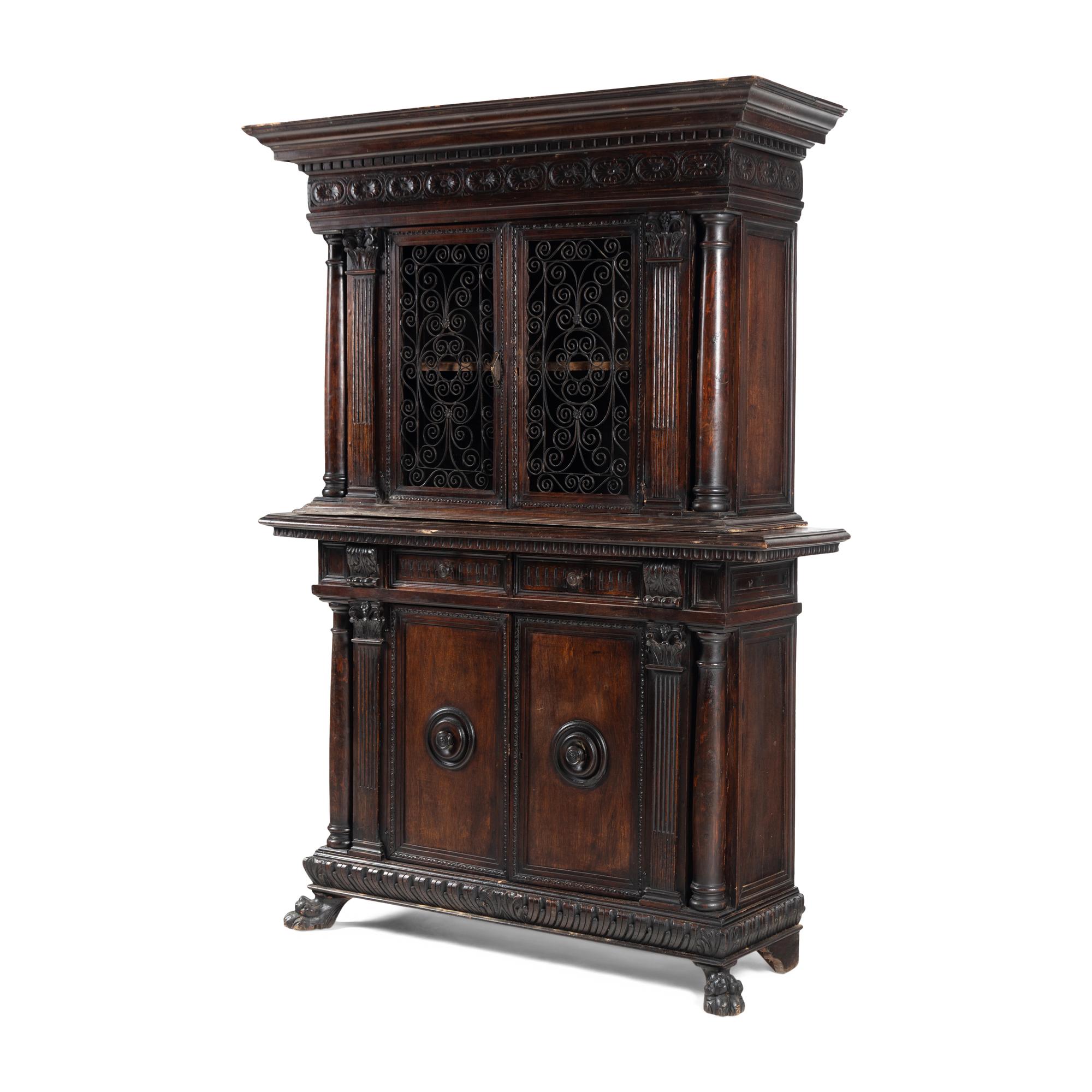 An Italian Renaissance Style Carved Walnut Cabinet