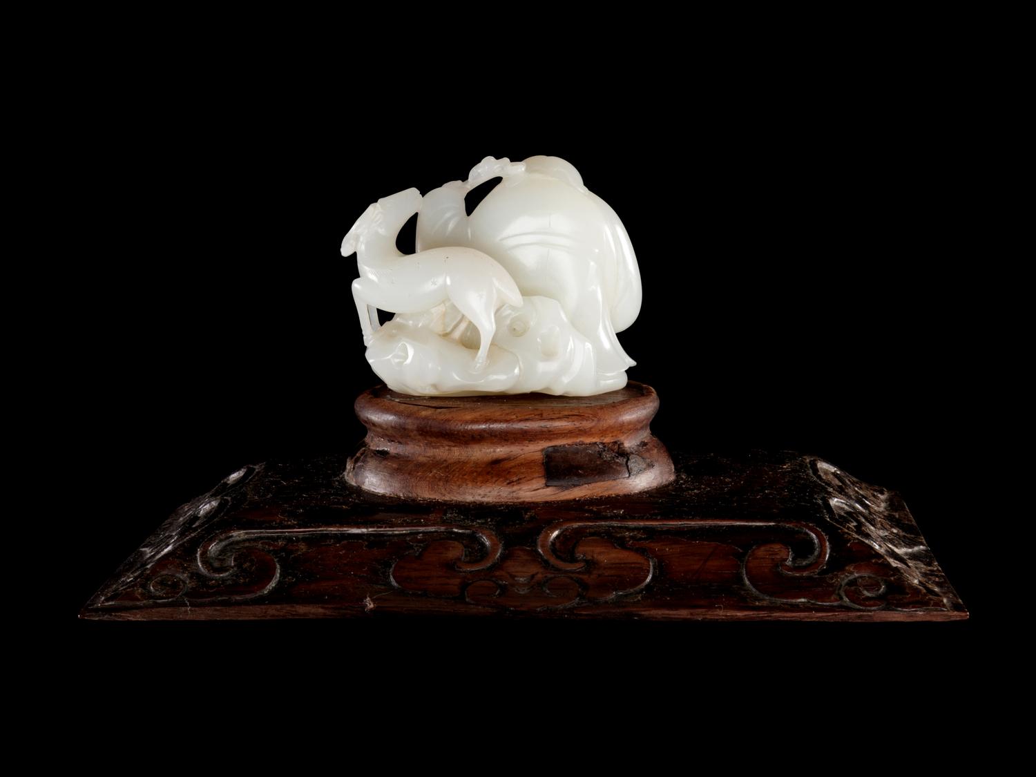A White Jade Figural Group