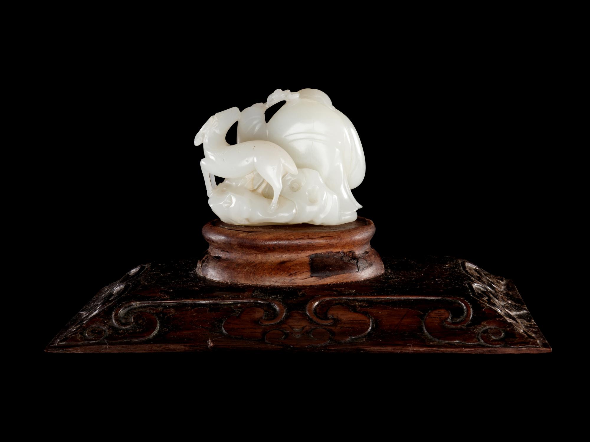 A White Jade Figural Group