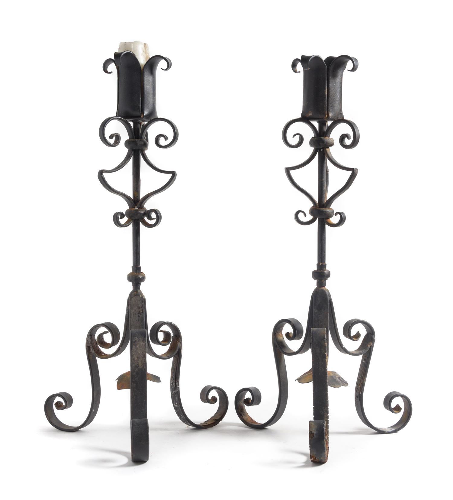 A Pair of Wrought Iron Prickets Height 27 inches.