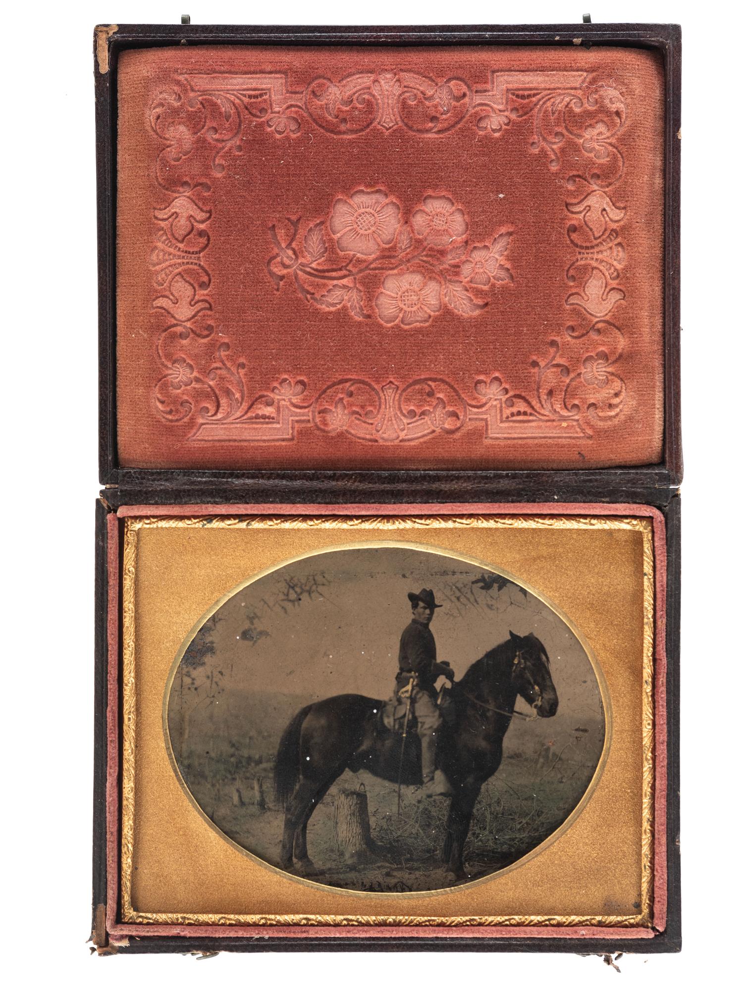 [CIVIL WAR]. Quarter plate tintype of a Federal cavalry soldier on horseback.