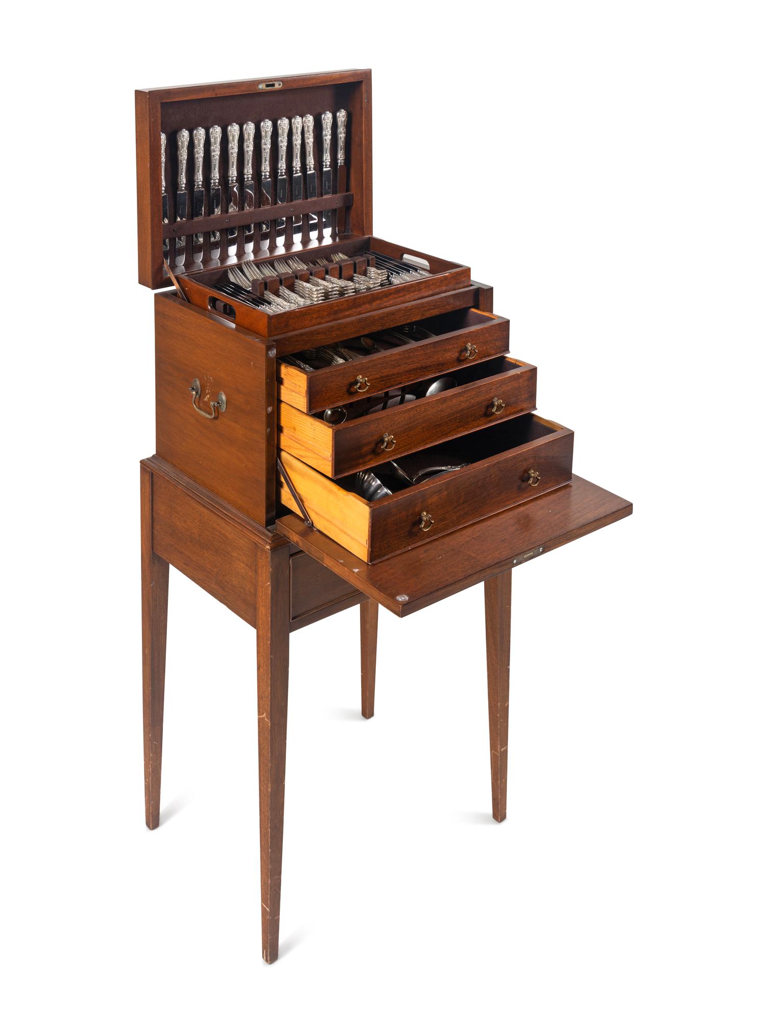 A Tiffany and Co. English King Silver Flatware Service in a Fitted Mahogany Chest