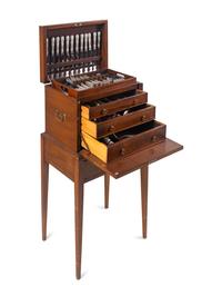 A Tiffany and Co. English King Silver Flatware Service in a Fitted Mahogany Chest