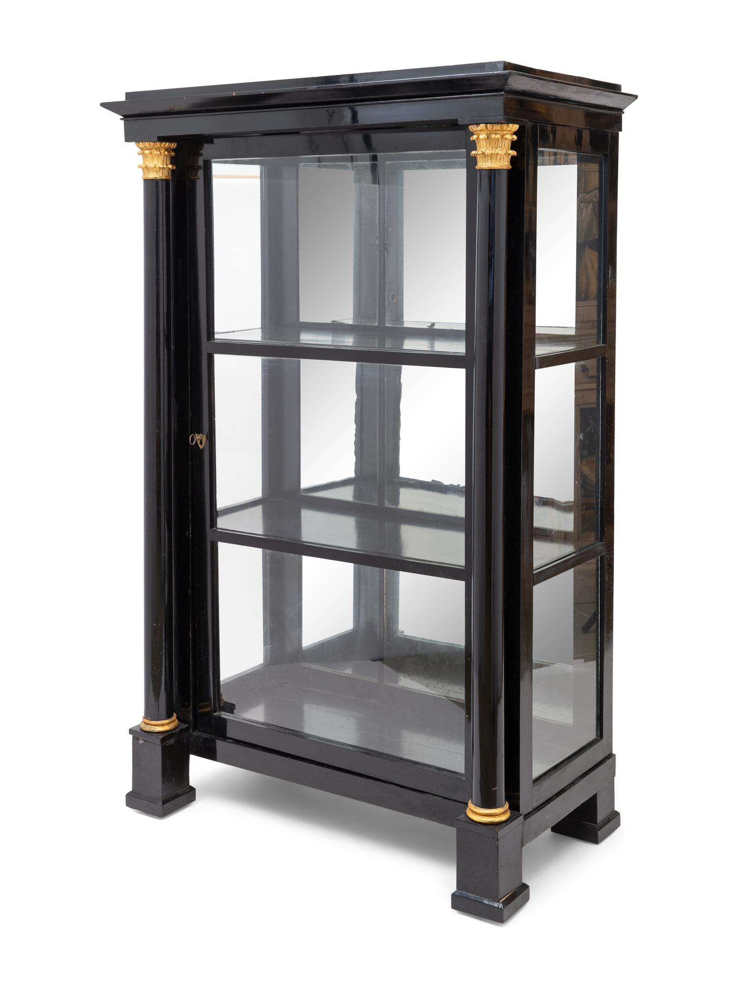 An Austrian Neoclassical Black Painted and Parcel-Gilt Vitrine Cabinet