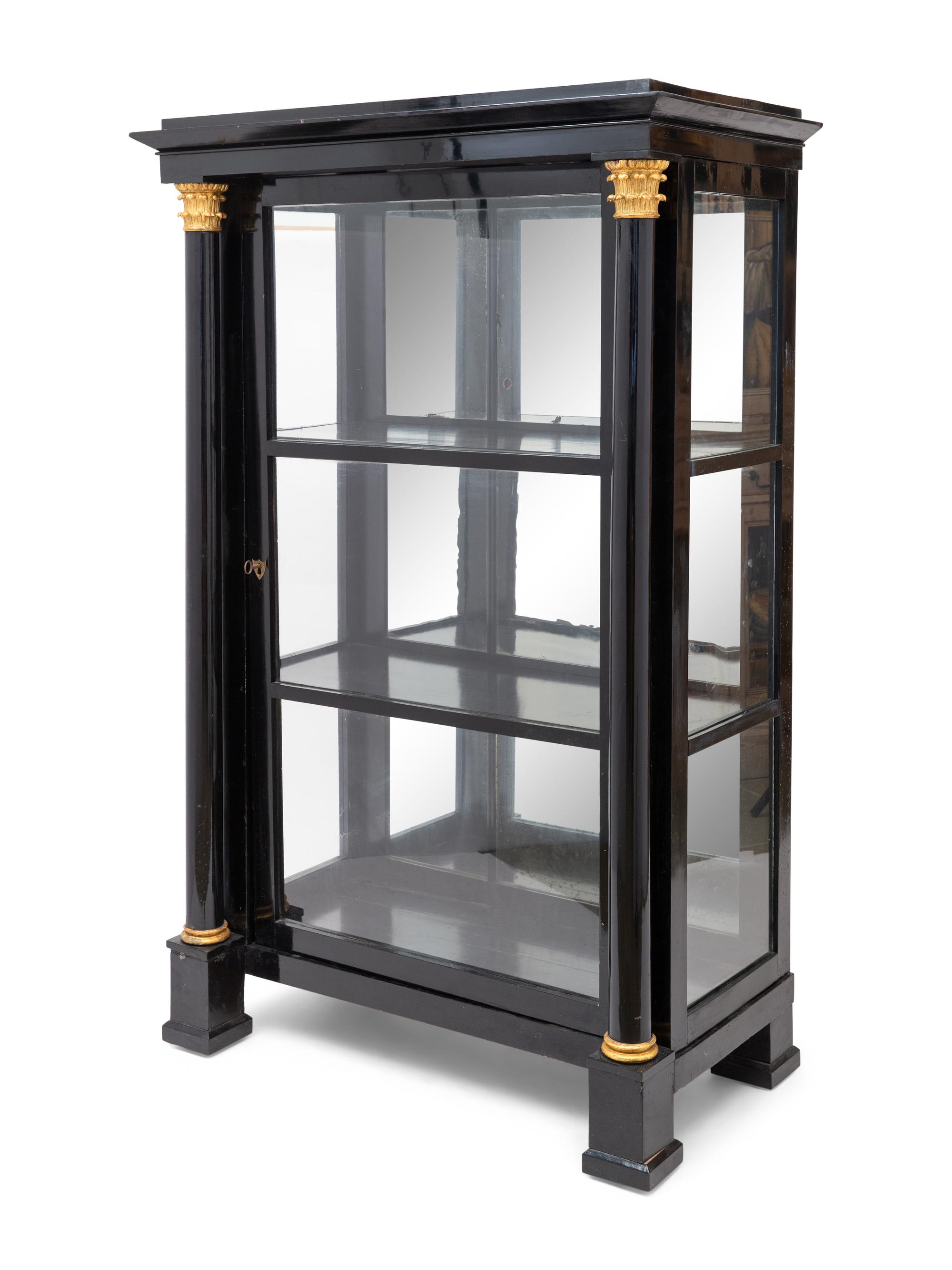 An Austrian Neoclassical Black Painted and Parcel-Gilt Vitrine Cabinet