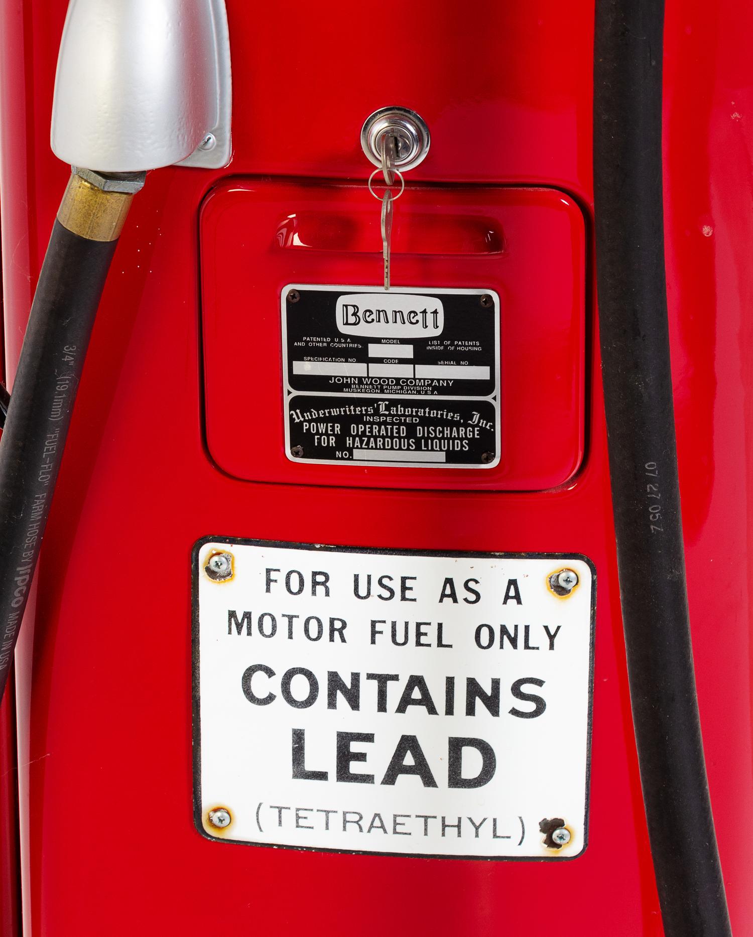 A Bennett Enameled Gasoline Pump Height 76 inches. — FIRST HALF 20TH CENTURY
