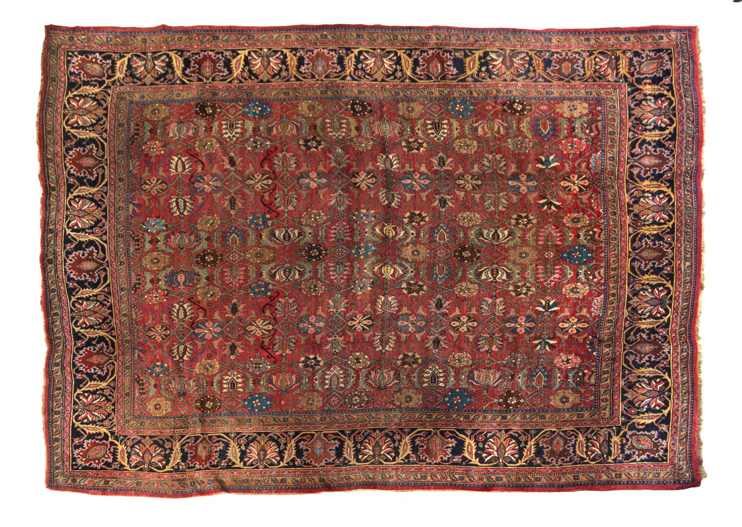 A Persian Wool Rug 12 feet 7 inches x 9 feet 2 inches.