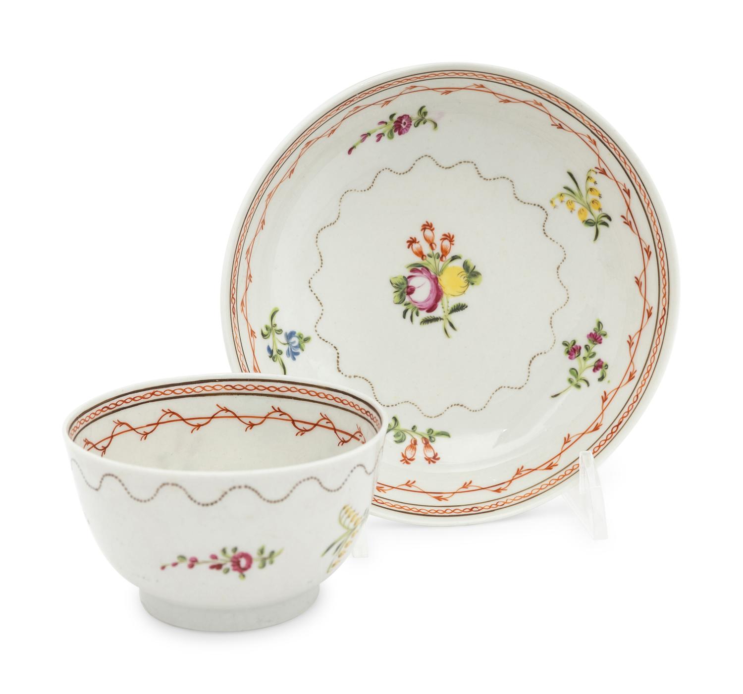 A Set of Four English Porcelain Tea Bowls and Saucers