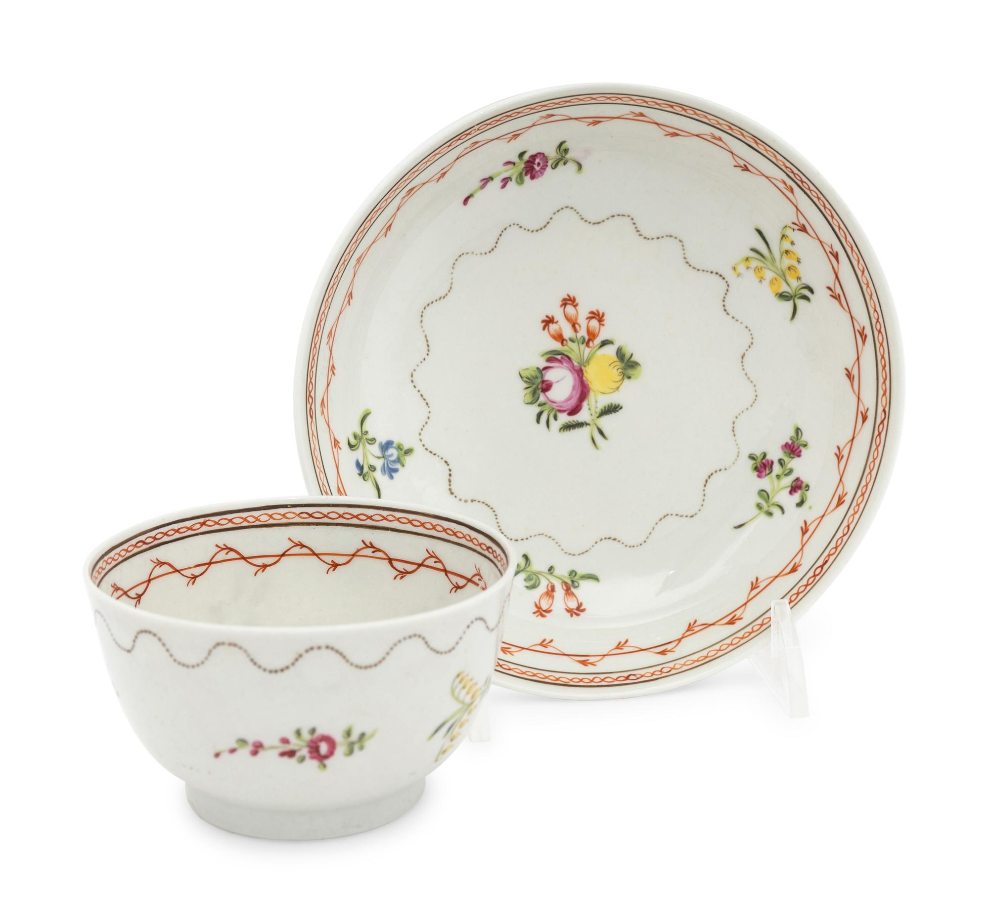 A Set of Four English Porcelain Tea Bowls and Saucers