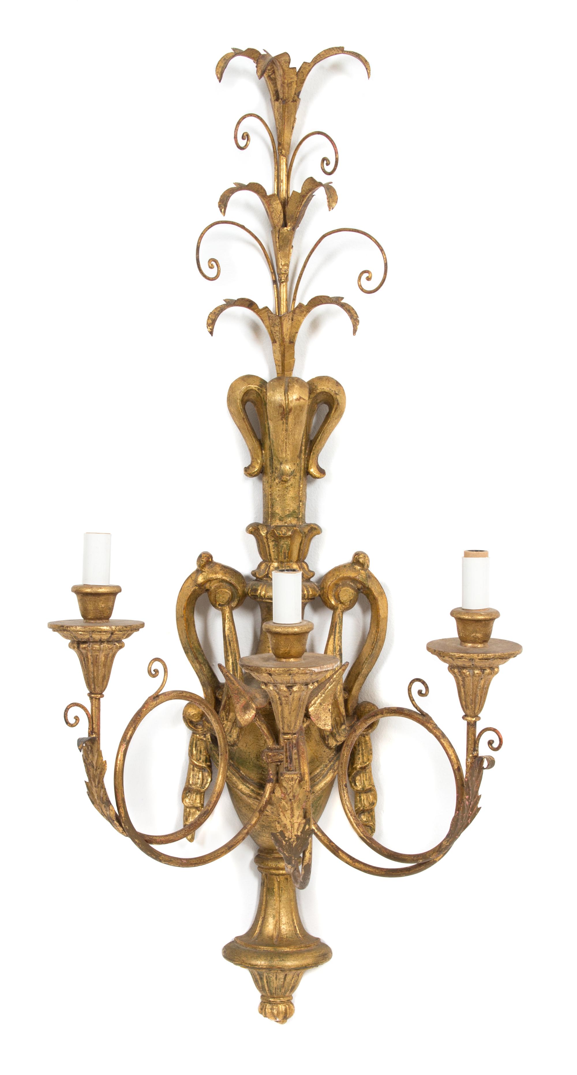 An Italian Louis XV Style Giltwood Three-Light Wall Sconce Height 34 inches. — 20TH CENTURY