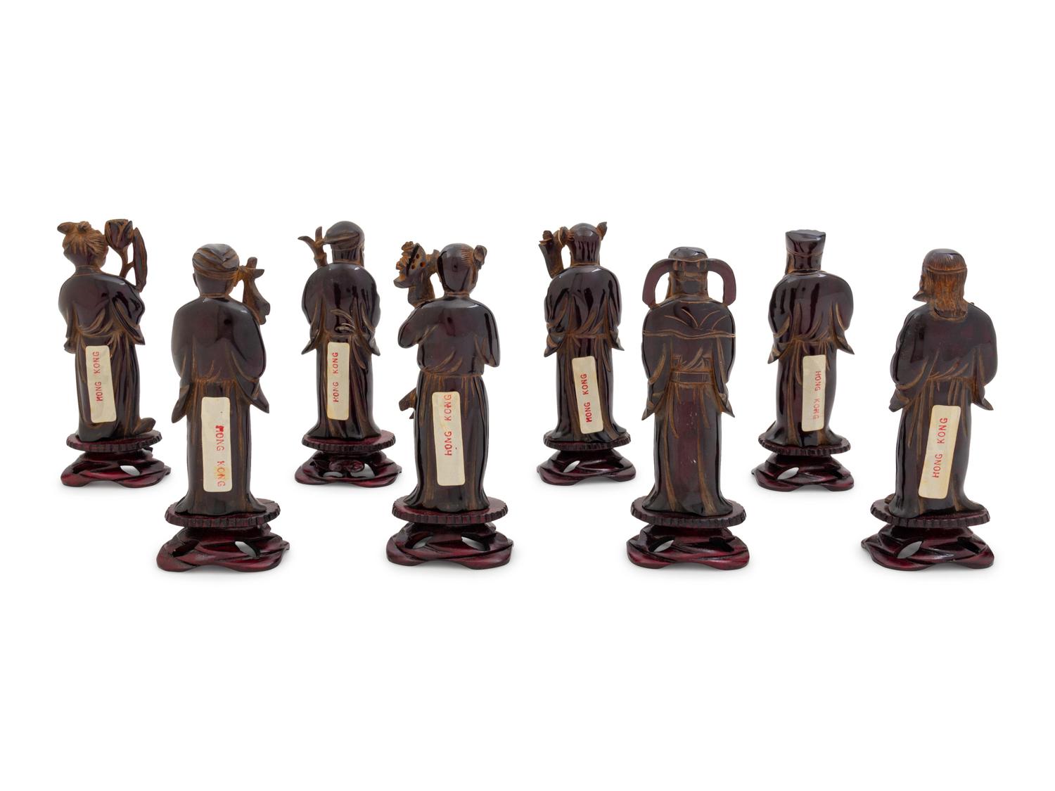 Eight Chinese Black Hardstone Figures of Immortals