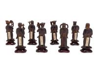 Eight Chinese Black Hardstone Figures of Immortals