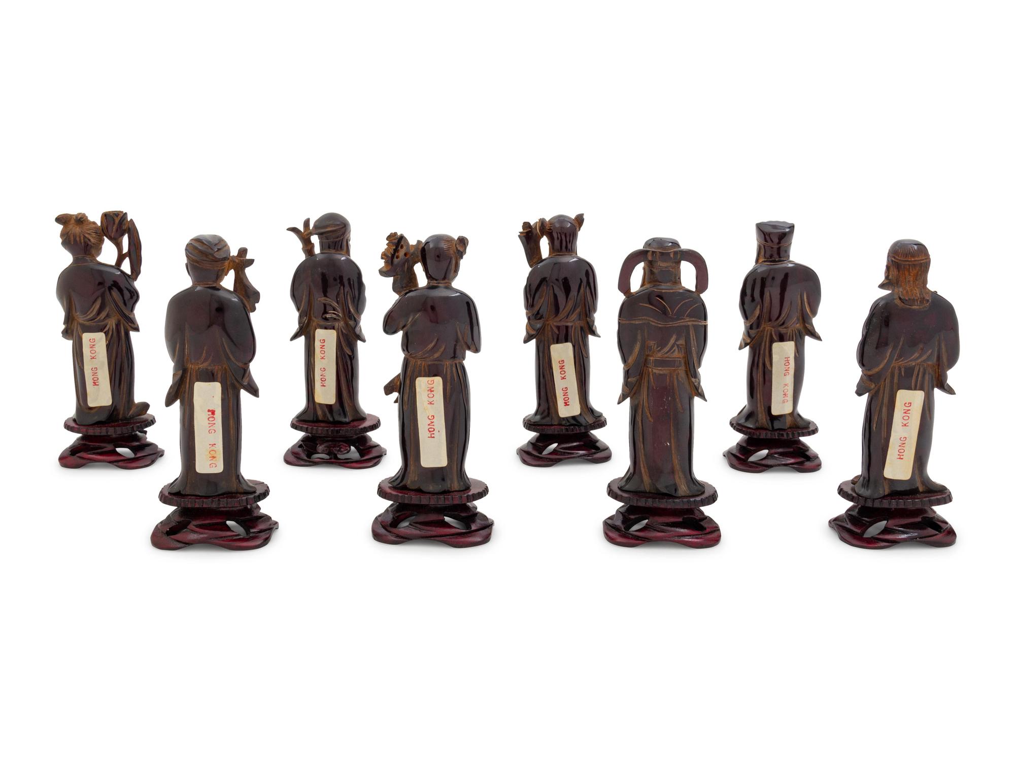 Eight Chinese Black Hardstone Figures of Immortals