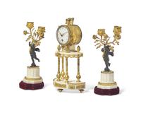 A Louis XVI Style Gilt and Patinated Bronze Mounted White Marble Three-Piece Clock Garniture