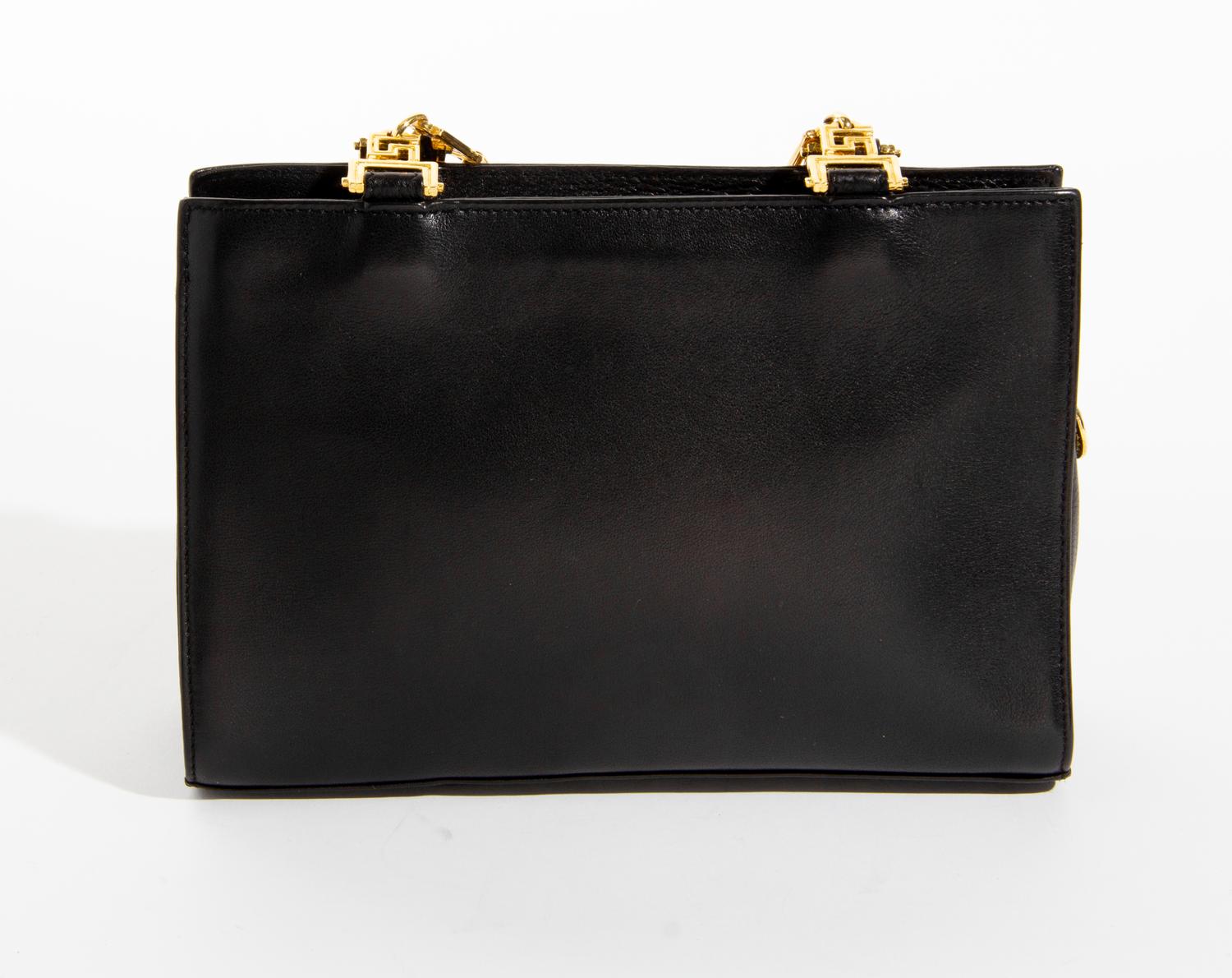 A Gianni Versace Black Leather Chain Shoulder Bag, 9.25" x 6.25" x 2.75"; Strap drop: 18.75".