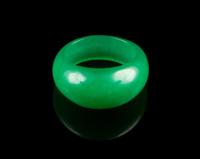 A Green Quartz Archer's Ring Diameter of interior 13/16 inch.