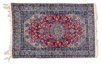 A Nain Wool Rug 5' 6 1/2" x 3' 5" — 20TH CENTURY