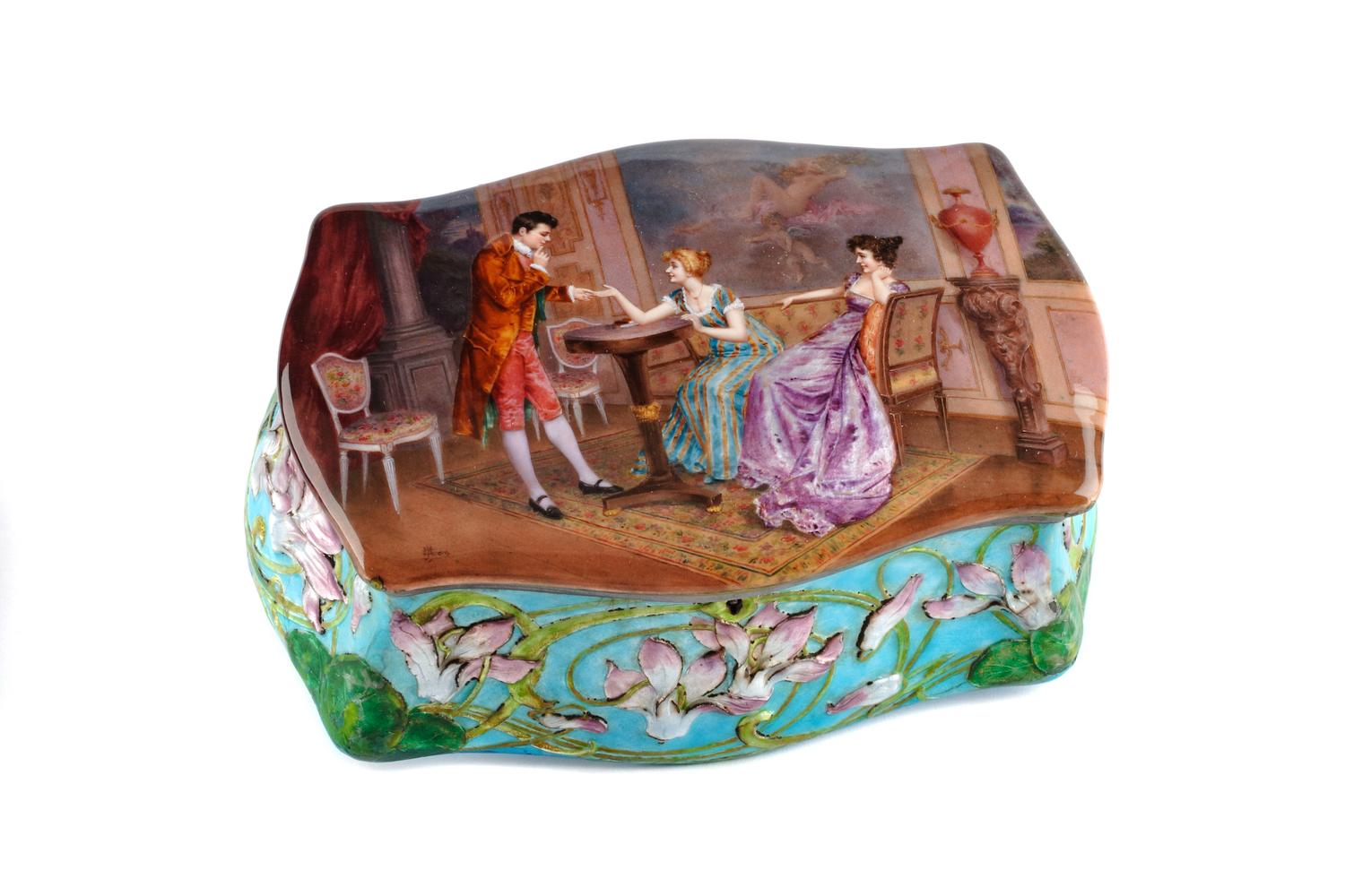 An Austrian Enameled Silver Jewelry Box, , of serpentine outline, the hinged top enameled to show a gentleman and two ladies in an inte