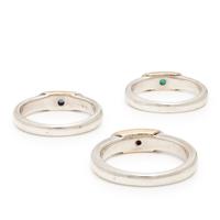 Collection of Three Sterling Silver, Yellow Gold, and Gemstone Rings