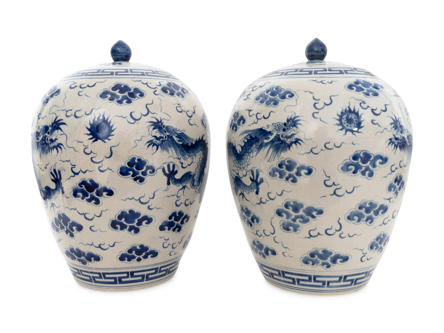 A Pair of Large Chinese Porcelain Blue and White Dragon Lidded Urns
