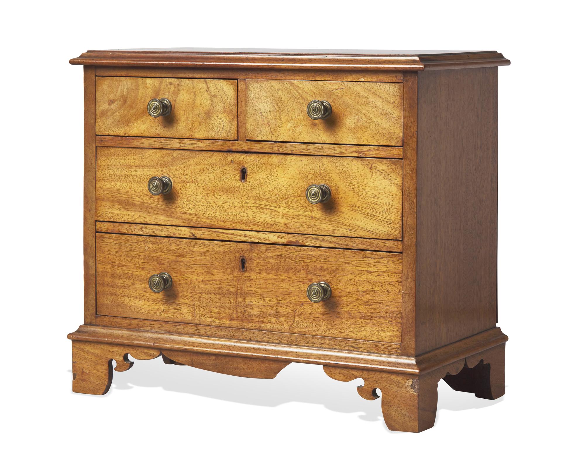 A Miniature George III or Regency Mahogany Chest of Drawers