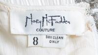 A Mary McFadden White Pleated Column Gown, Size 8.
