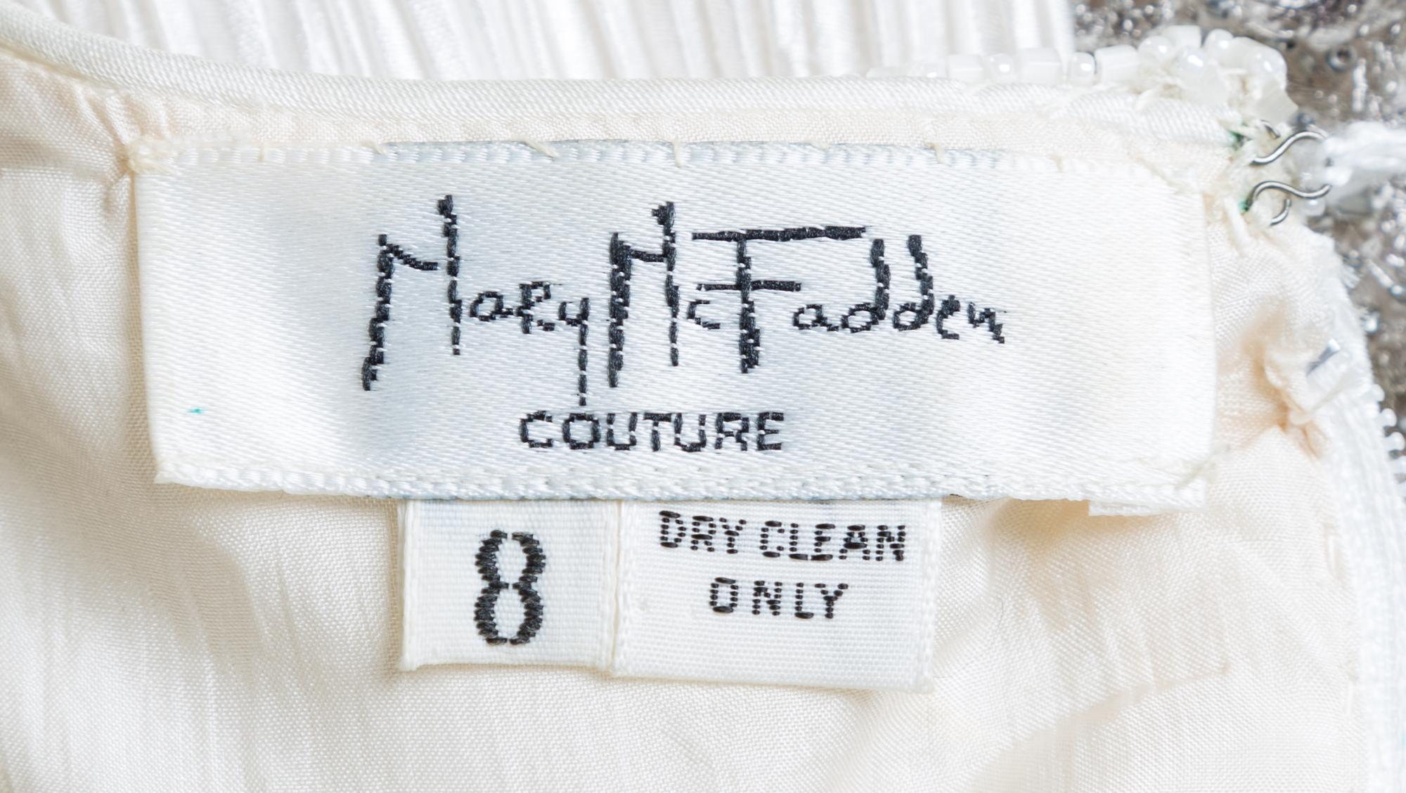 A Mary McFadden White Pleated Column Gown, Size 8.