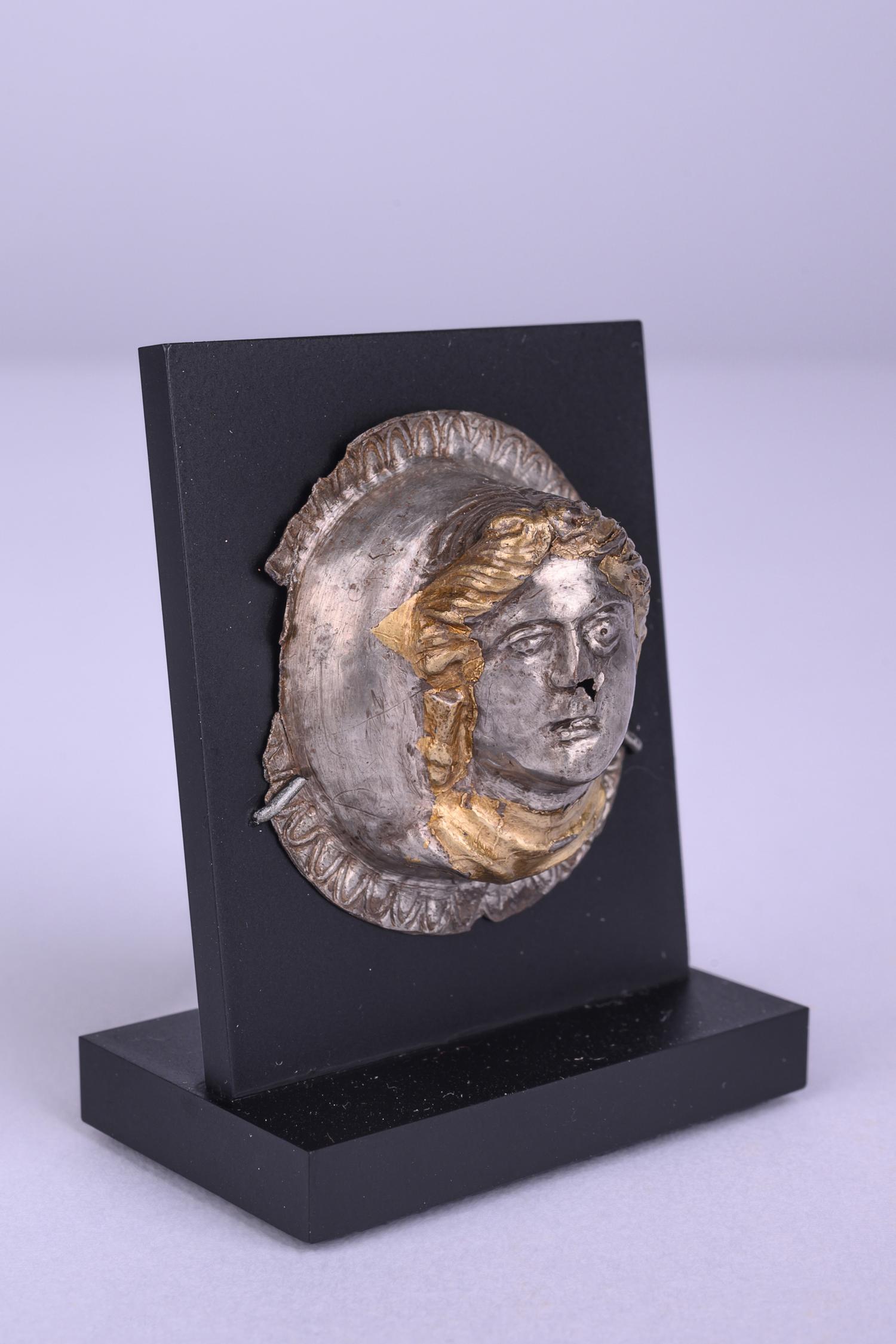 A Thracian Gilt-Silver Tondo of a Female Bust