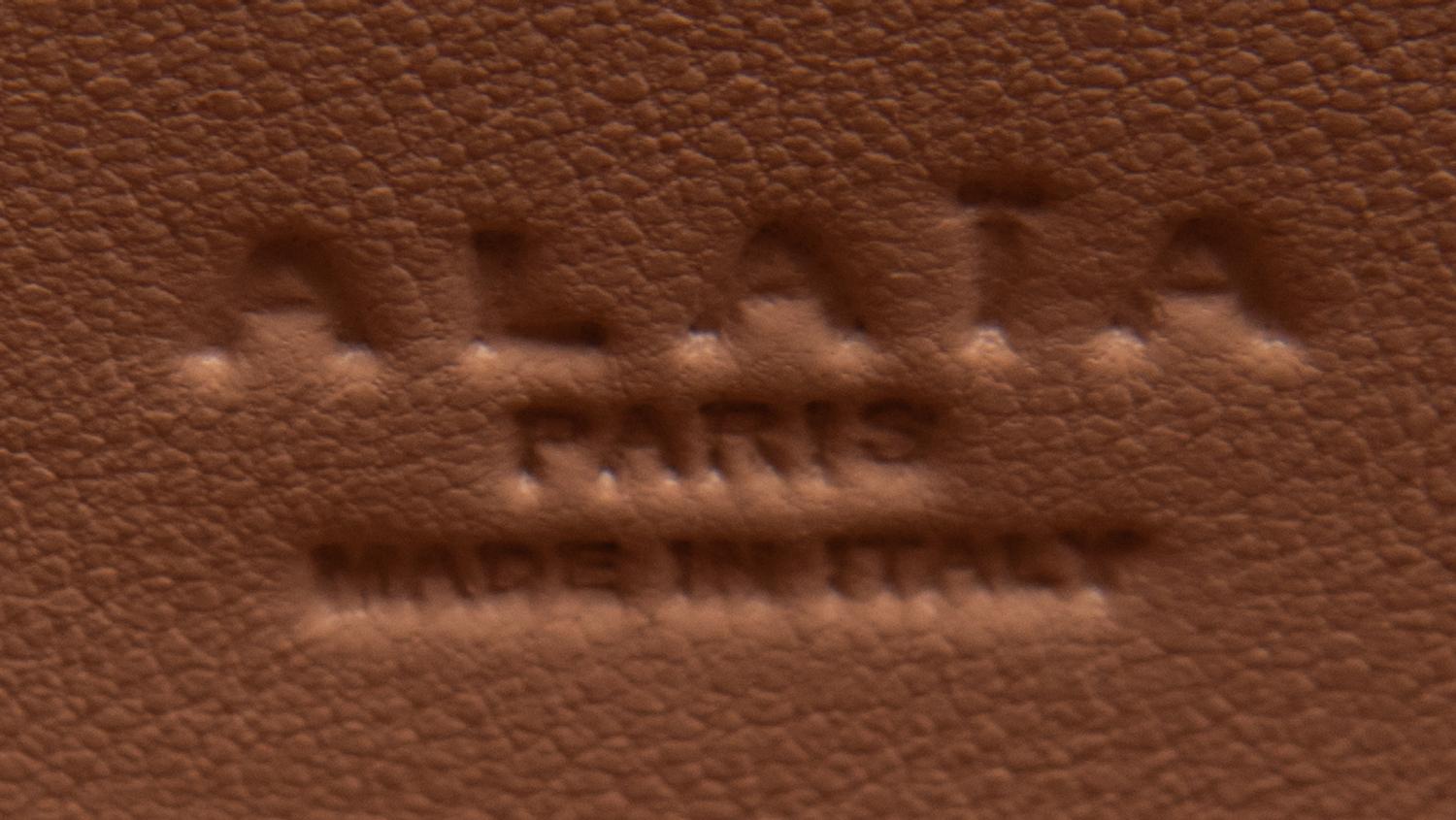 ALAÏA, FRINGED PYTHON FLAP BAG