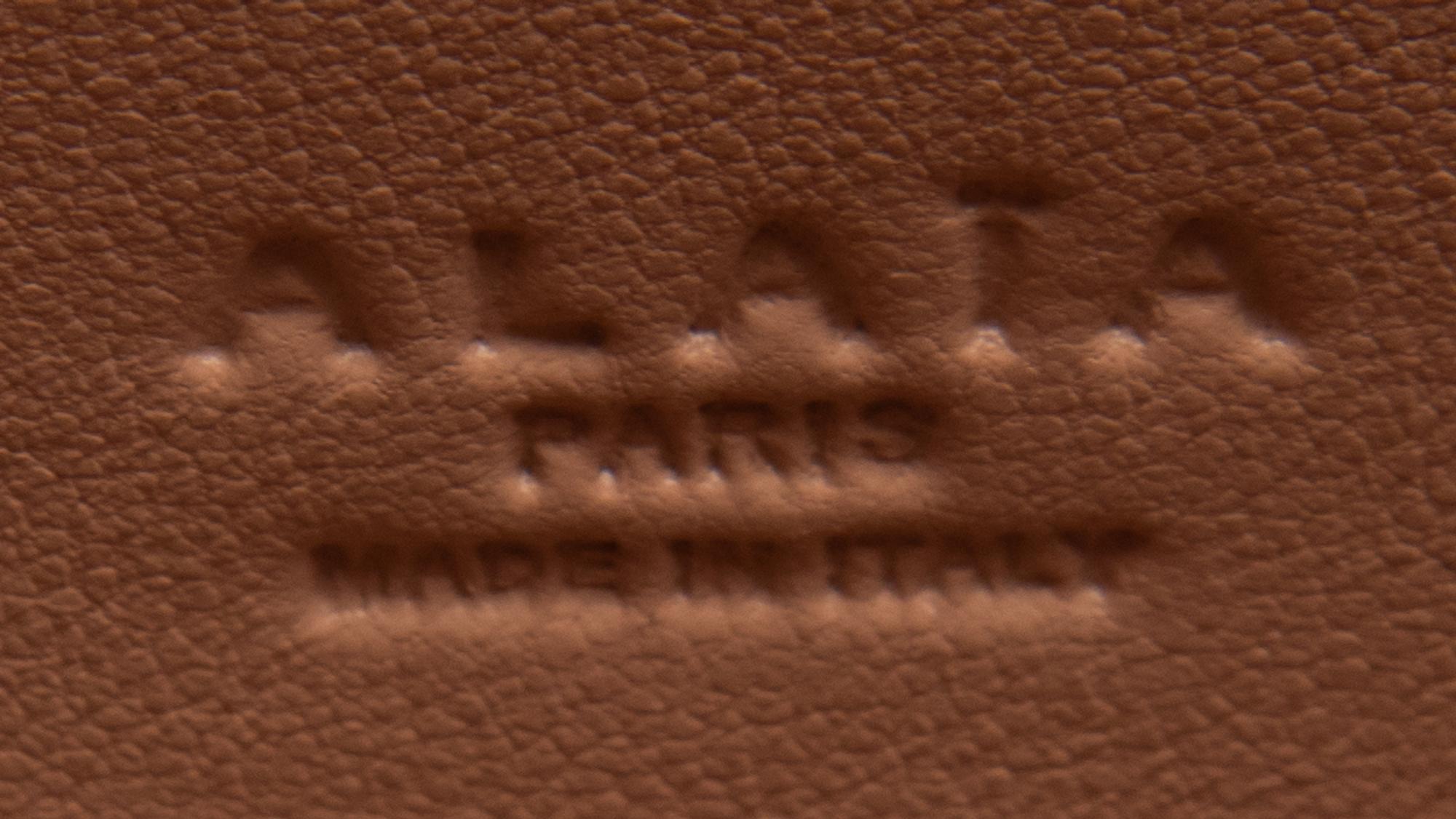 ALAÏA, FRINGED PYTHON FLAP BAG