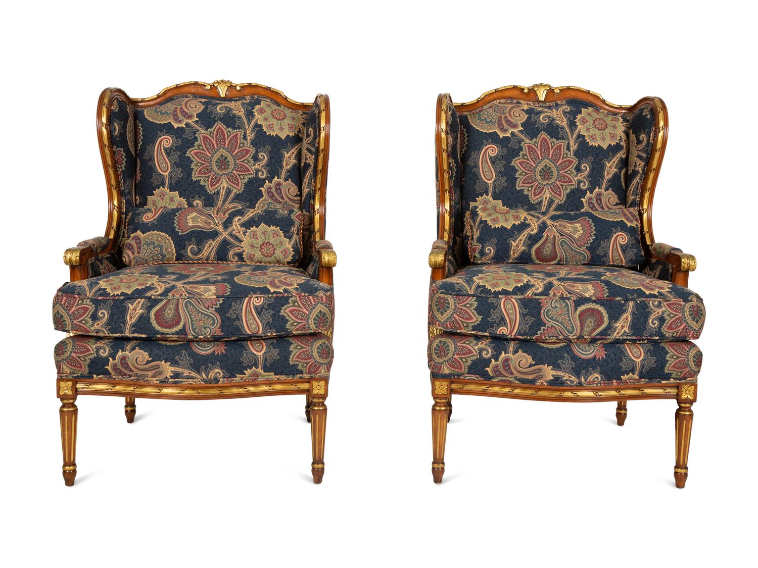 A Pair of Louis XVI Style Parcel Gilt Fruitwood Bergères