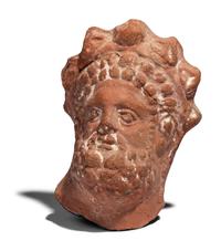 An Egyptian Terracotta Head of Serapis
