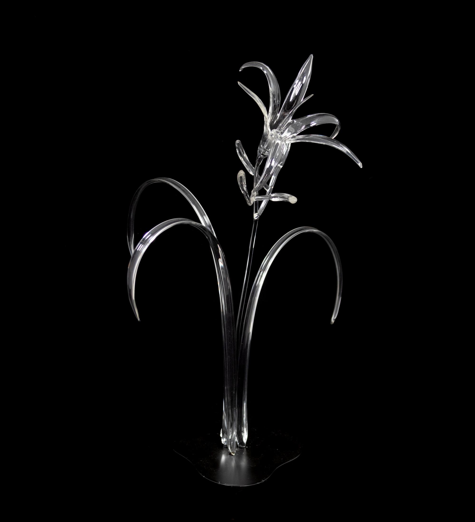 A Glass Flower and Faux Floral Arrangement