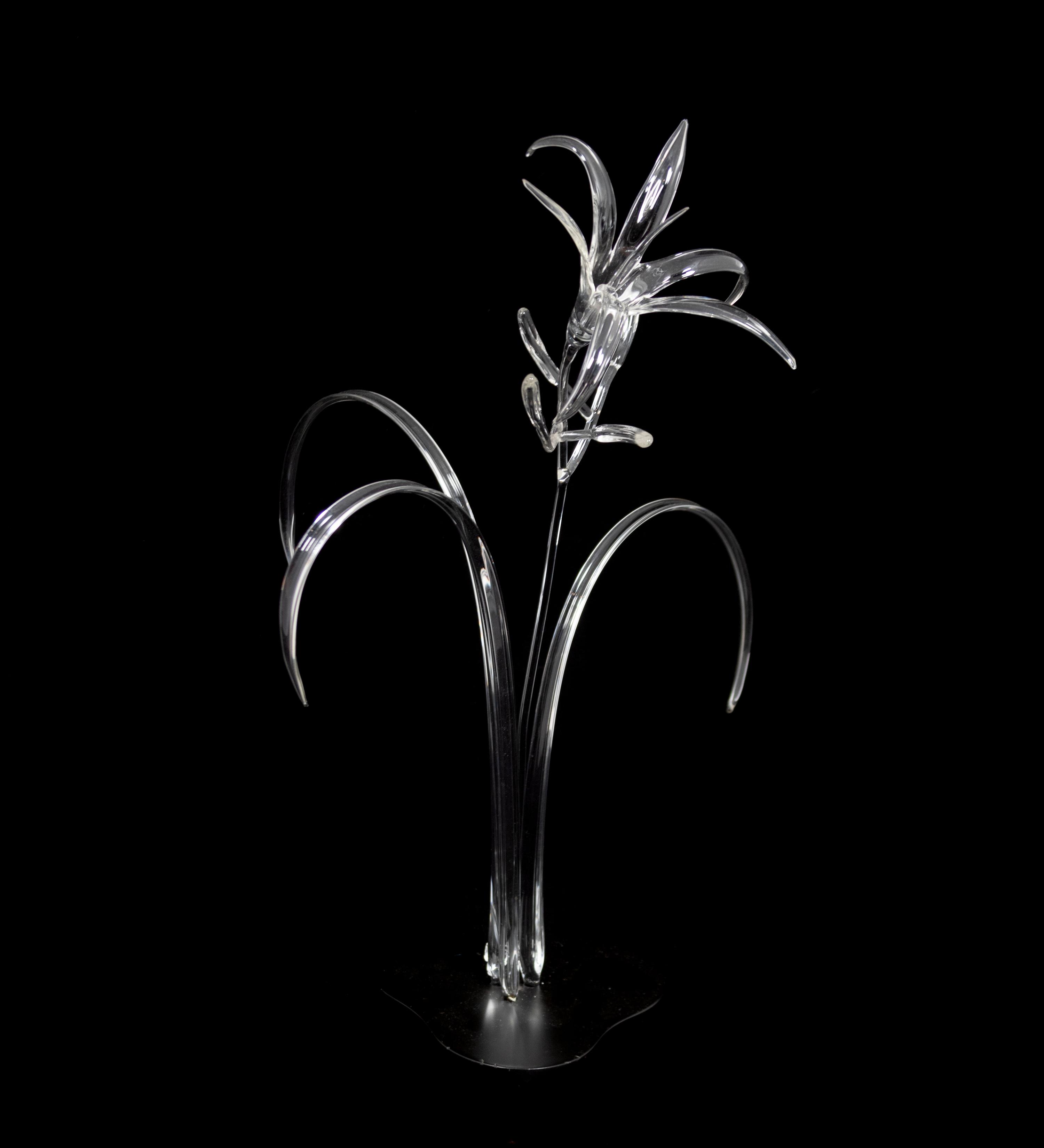 A Glass Flower and Faux Floral Arrangement