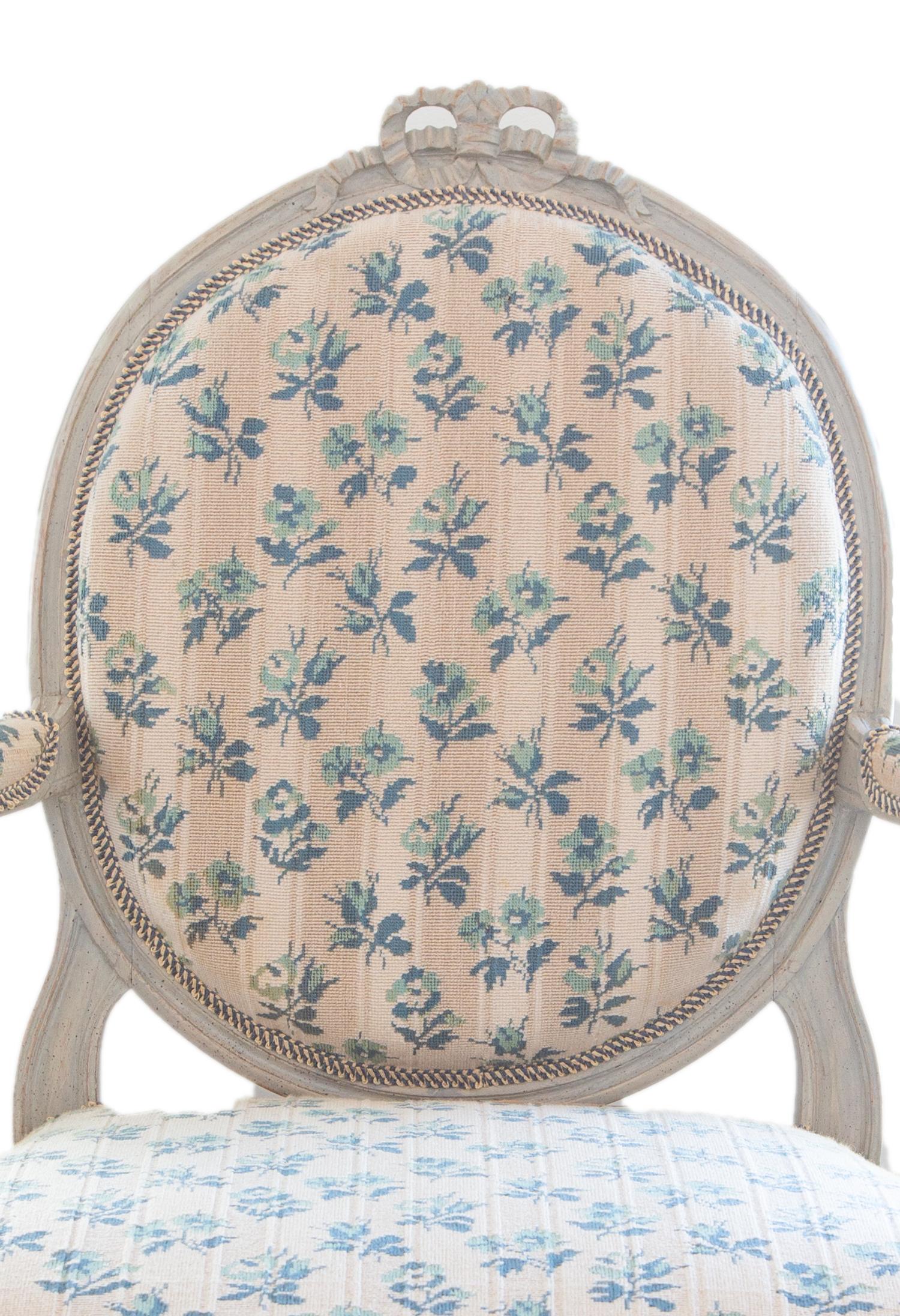 A Pair of Louis XVI Carved and Gray Painted Fauteuils