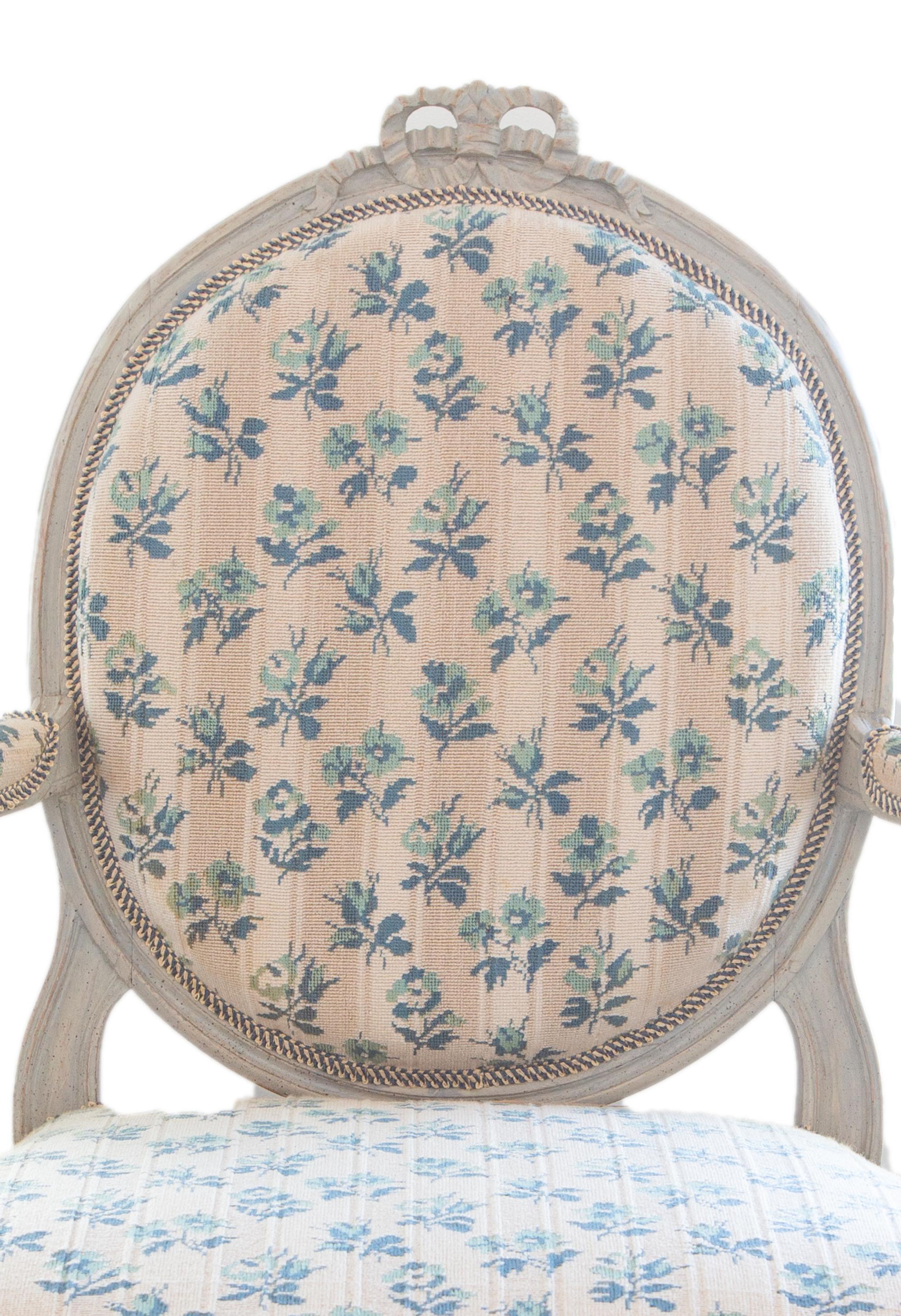 A Pair of Louis XVI Carved and Gray Painted Fauteuils