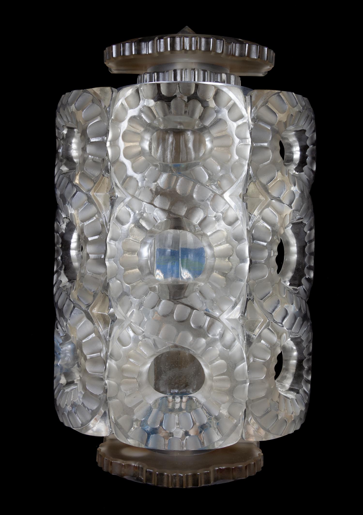 A Molded Glass Seville Sconce, Attributed to Lalique
